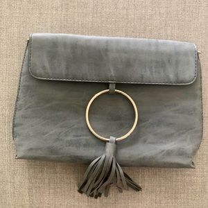 Gray envelope clutch handbag with ring and fringe detail